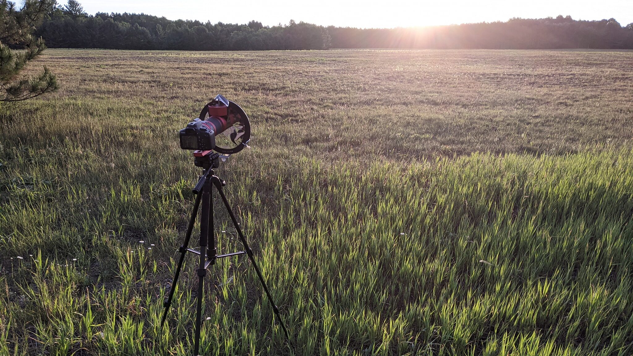 My camera taking a photo of the solar eclipse.