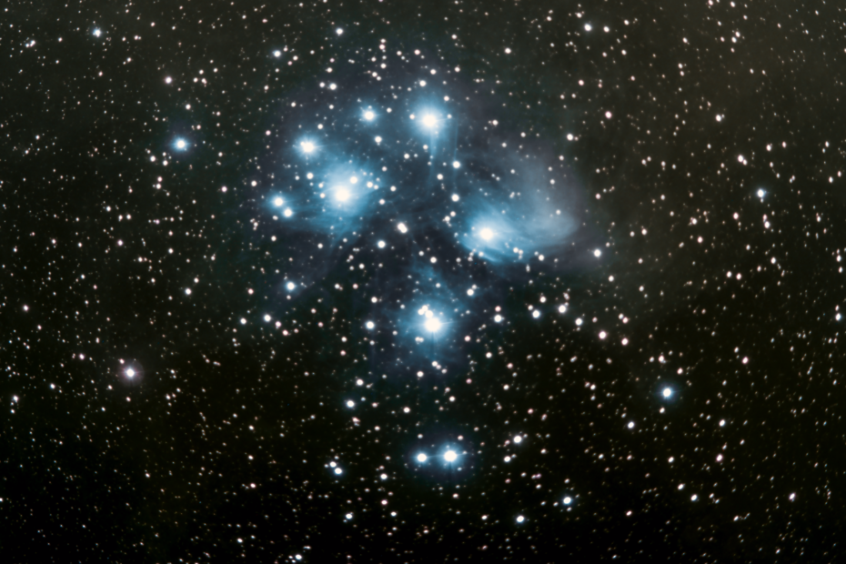 Messier 45, The Pleiades is a bright blue nebula in the winter sky